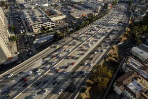 image of highway with traffic and lots of cars